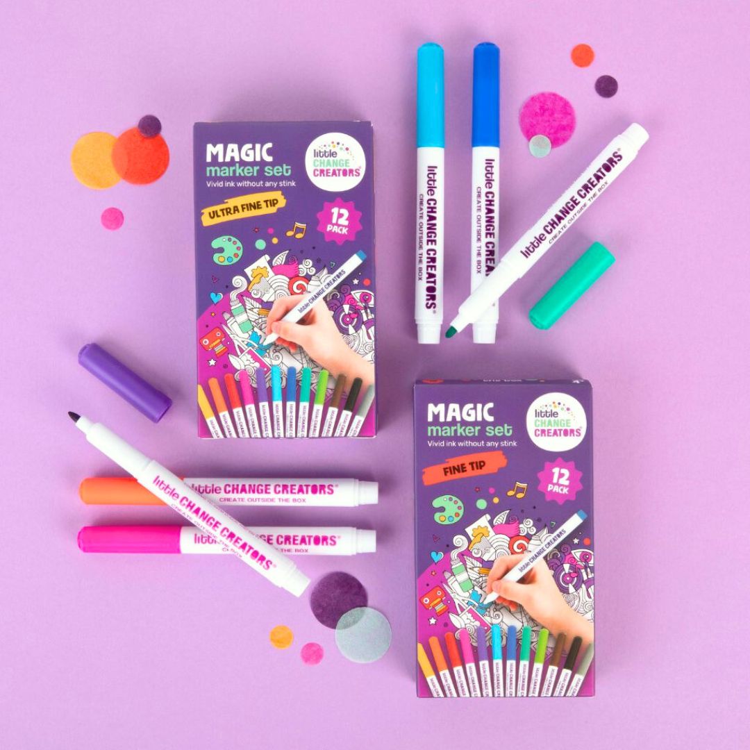 Magic marker sets with markers and colourful packaging on a purple background.