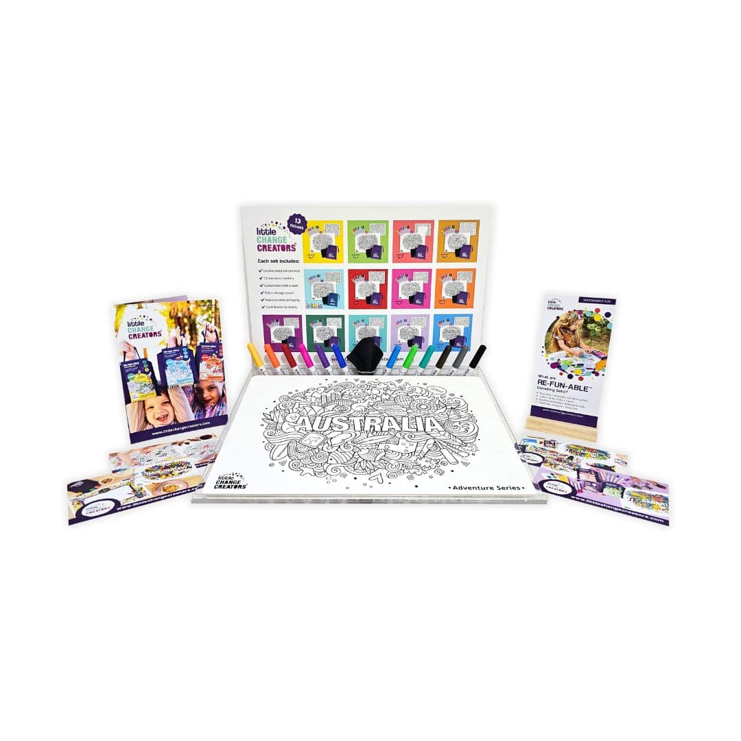 A retail display unit for Little Change Creators featuring an acrylic stand, silicone colouring mat, pen set and marketing materials.