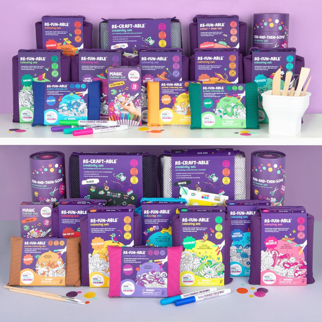 Assorted kids' craft kits and art supplies on a purple background.