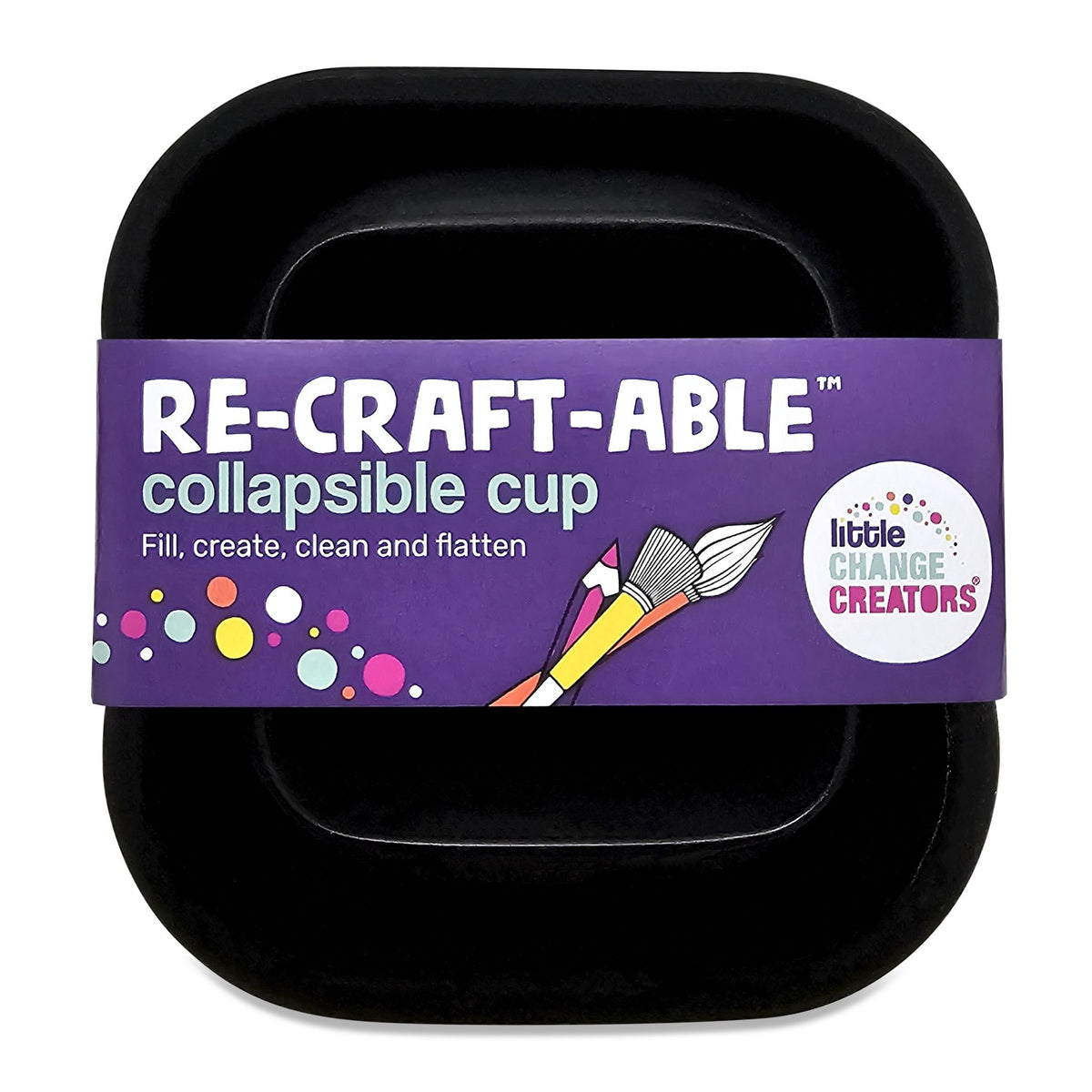 A black collapsible cup made from silicone. This image includes the packaging from Little Change Creators.