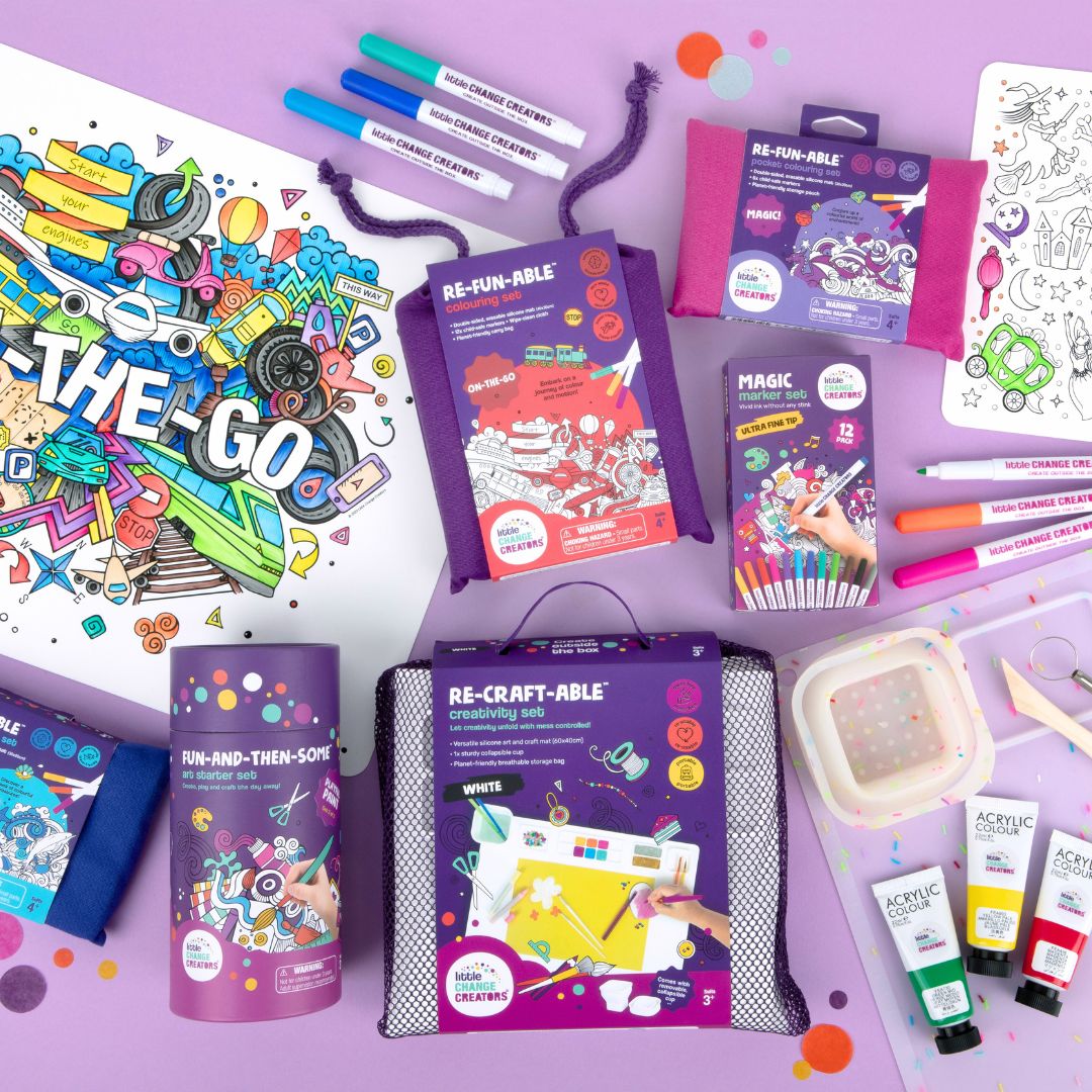 Assorted children's art supplies and craft kits on a purple background.