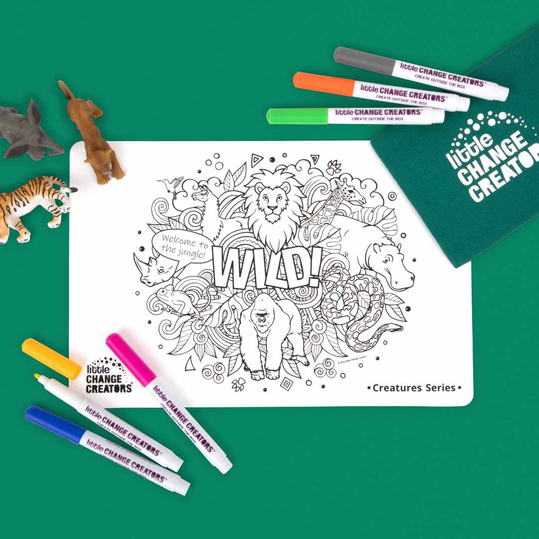 Silicone colouring mat with animal designs and markers on a green background, featuring 'Little Change Creators' branding.